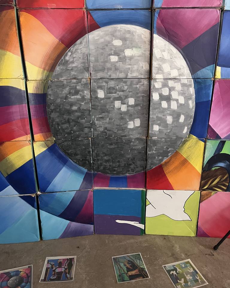 A bold painted mural wall used as a backdrop for recording and photo shoots.